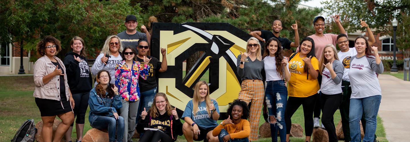 Cameron Students posing for a picture on Campus